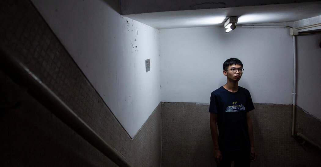 Hong Kong Activist Flees to Britain, Citing Police Pressure