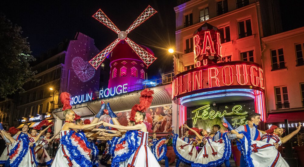 The Windmills Are Back Up on the Moulin Rouge